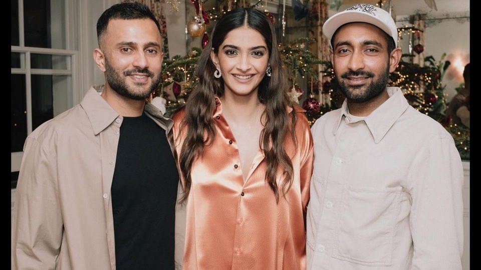 Anand Ahuja with Sonam Kapoor and his brother.&nbsp;