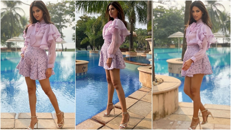 Harnaaz Sandhu in a lavender blouse and shorts set.&nbsp;