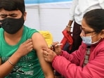 The Day 1 excitement was palpable at the vaccination centres at schools, hospitals, and special vaccination sites.(AFP) The Day 1 excitement was palpable at the vaccination centres at schools, hospitals, and special vaccination sites.(AFP)