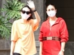 Bollywood's most fashionable sister duo Kareena Kapoor Khan and Karisma Kapoor arrived at their dad Randhir Kapoor's house today, January 3, in Mumbai. The paparazzi clicked the sister's outside the veteran actor's house while getting out of their cars. Both Kareena and Karisma, looking stylish as ever, posed for the shutterbugs.(HT Photo/Varinder Chawla)