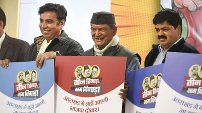 Congress leader Harish Rawat with senior leaders of the Uttarakhand at a press conference in New Delhi on Monday. (PTI) Congress leader Harish Rawat with senior leaders of the Uttarakhand at a press conference in New Delhi on Monday. (PTI)