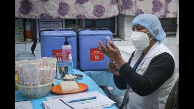 A health worker takes part in a dry run or a mock drill for Covid-19 coronavirus vaccine delivery at a model Covid-19 vaccination centre, New Delhi, January 2, 2021 (Sanchit Khanna/HT PHOTO) A health worker takes part in a dry run or a mock drill for Covid-19 coronavirus vaccine delivery at a model Covid-19 vaccination centre, New Delhi, January 2, 2021 (Sanchit Khanna/HT PHOTO)