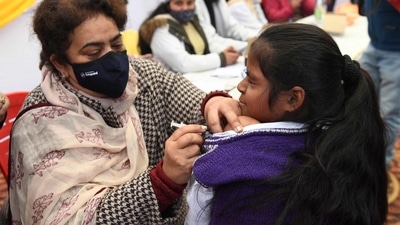 India kickstarted the vaccination drive for children aged 15 to 18 against the coronavirus from Monday. The registration process began on January 1 this year. On December 25, 2021, Prime Minister Narendra Modi had given his nod to vaccinate children in this age group during his address to the nation. He also mentioned that the precautionary third dose for the healthcare workers, frontline workers, and citizens above 60 years with severe health conditions will commence from January 10, 2022. (AFP) India kickstarted the vaccination drive for children aged 15 to 18 against the coronavirus from Monday. The registration process began on January 1 this year. On December 25, 2021, Prime Minister Narendra Modi had given his nod to vaccinate children in this age group during his address to the nation. He also mentioned that the precautionary third dose for the healthcare workers, frontline workers, and citizens above 60 years with severe health conditions will commence from January 10, 2022. (AFP)