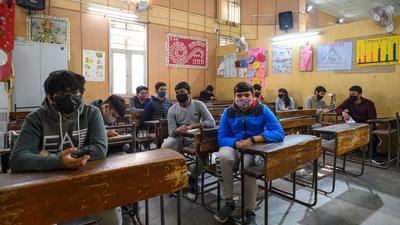 School students wait to get a Covid vaccine at a government school in Delhi. (Amal KS/HT Photo) School students wait to get a Covid vaccine at a government school in Delhi. (Amal KS/HT Photo)