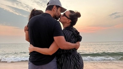 Angad Bedi soaked in the sunset with daughter Mehr in his arms while Neha Dhupia joined him with their three-month-old son.&nbsp; 