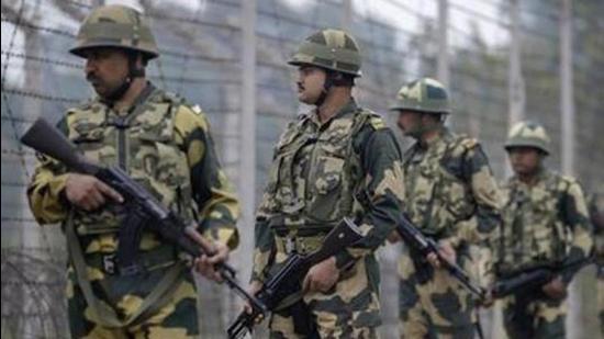Border Security Force personnel patrol near the international border in Jammu. (PTI/File)