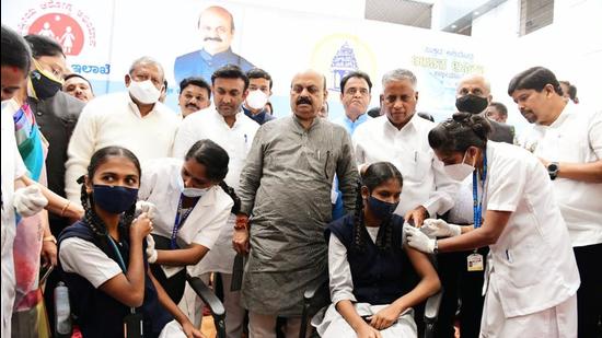 Karnataka chief minister Basavaraj Bommai present during the vaccination of girls at BBMP Govt Girls High School in Bengaluru on Monday. (ANI) Karnataka chief minister Basavaraj Bommai present during the vaccination of girls at BBMP Govt Girls High School in Bengaluru on Monday. (ANI)