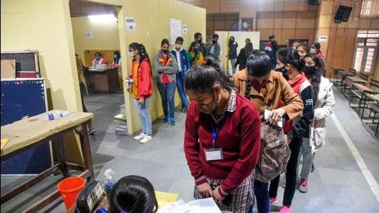 Children stand in a queue to get themselves registered for getting a dose of Covid-19 vaccine as vaccination drive starts for the age group between 15-18 at a vaccination centre, in New Delhi, on Monday. (ANI)