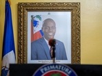 A picture of the late Haitian President Jovenel Moise hangs on a wall.(Reuters)