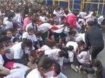 Participants are seen falling during the marathon organised by the Congress party in Uttar Pradesh's Bareilly on Tuesday.