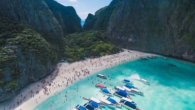 Thailand has reopened Maya Bay, a white sand beach made famous by the 2000 film The Beach starring Leonardo DiCaprio, more than three years after closing it to allow its ecosystem to recover from the impact of thousands of visitors each day. (Unsplash)