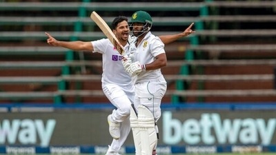 South Africa's batsman Temba Bavuma, front, reacts after being dismissed India's bowler Shardul Thakur, during the second day of the 2nd Test Cricket match between South Africa and India at the Wanderers stadium in Johannesburg, South Africa, Tuesday, Jan. 4, 2022. (AP Photo/Themba Hadebe) (AP) South Africa's batsman Temba Bavuma, front, reacts after being dismissed India's bowler Shardul Thakur, during the second day of the 2nd Test Cricket match between South Africa and India at the Wanderers stadium in Johannesburg, South Africa, Tuesday, Jan. 4, 2022. (AP Photo/Themba Hadebe) (AP)