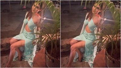 Mouni teamed the bralette-style top with a high-waisted maxi skirt featuring a risqué thigh-baring slit on the side, gathered details on the waistline and a figure-skimming silhouette. It also comes in the same pastel blue shade, making for a great co-ord fashion moment. (Instagram/@imouniroy) Mouni teamed the bralette-style top with a high-waisted maxi skirt featuring a risqué thigh-baring slit on the side, gathered details on the waistline and a figure-skimming silhouette. It also comes in the same pastel blue shade, making for a great co-ord fashion moment. (Instagram/@imouniroy)