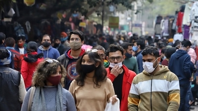 People throng Janpath Market amid a surge in Omicron cases, in New Delhi on Sunday. (ANI Photo) People throng Janpath Market amid a surge in Omicron cases, in New Delhi on Sunday. (ANI Photo)