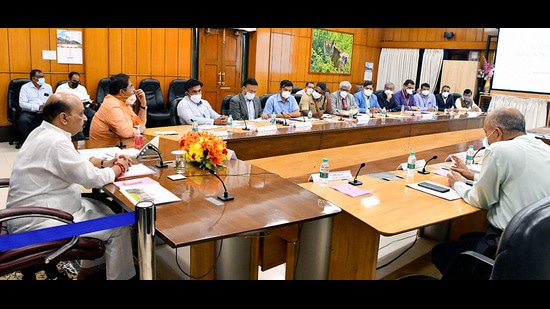 Karnataka chief minister Basavaraj S Bommai holds a meeting with state cabinet ministers, senior officials, and experts regarding the Covid-19 situation in the state, in Bengaluru on Tuesday. (ANI)