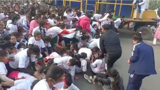 Participants are seen falling during the marathon organised by the Congress party in Uttar Pradesh's Bareilly on Tuesday.