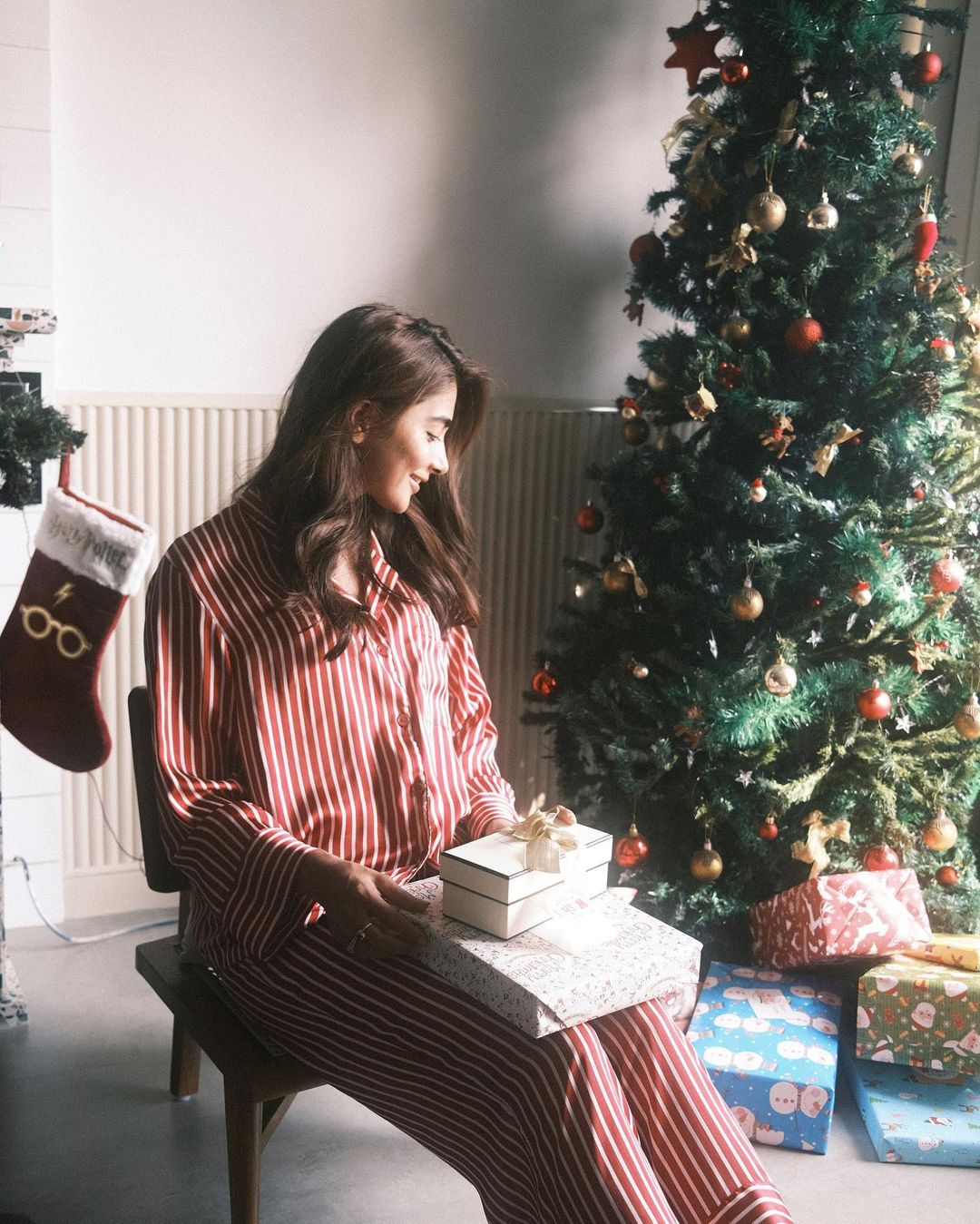 Pooja Hegde wearing striped pyjamas.