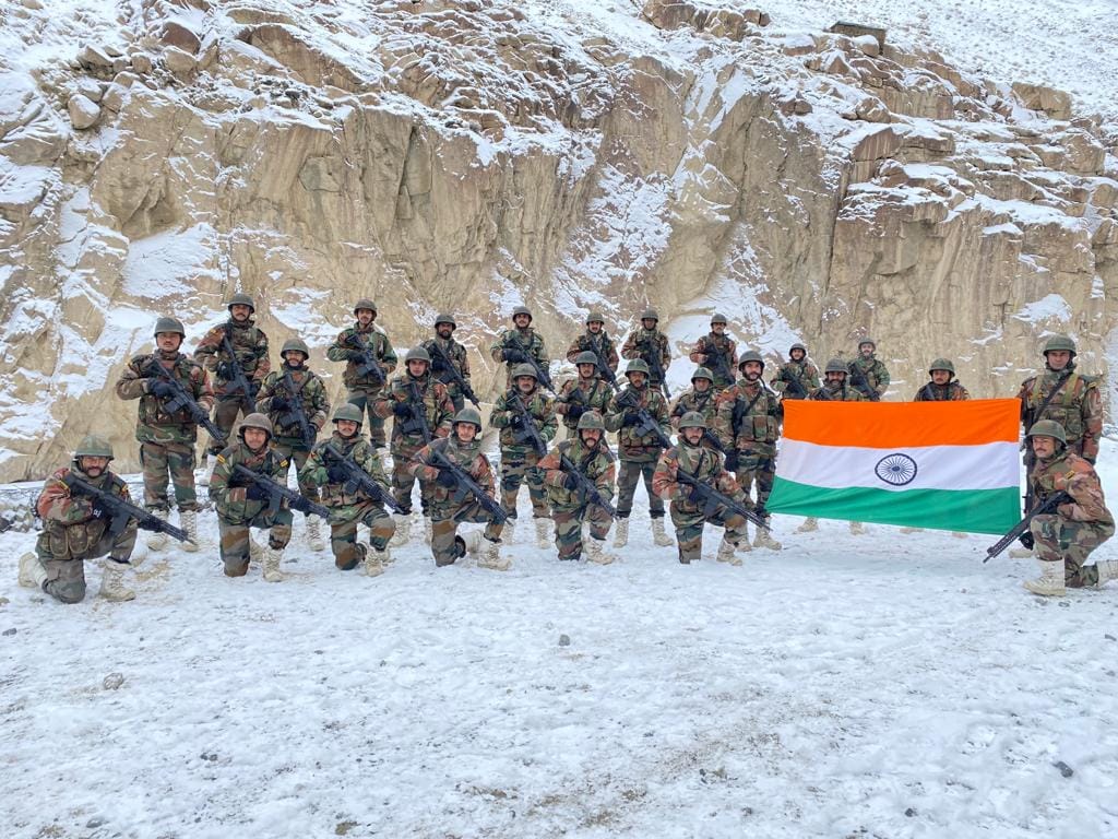 Indian soldiers seen with the national flag at Galwan Valley. Indian soldiers seen with the national flag at Galwan Valley.