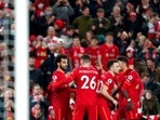 Liverpool's Mohamed Salah celebrates with teammates Liverpool's Mohamed Salah celebrates with teammates