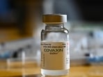 A Covaxin vial is seen during a vaccination drive against the Covid-19 coronavirus during a vaccination drive for youths in the 15-18 age group, at a school in Kolkata on January 4, 2022. (Photo by DIBYANGSHU SARKAR / AFP)