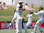 Bangladesh's Taijul Islam, top left, celebrates catching Blackcaps Trent Boult with team mates during play on day five of the first cricket test between Bangladesh and New Zealand at Bay Oval in Mount Maunganui, New Zealand. Bangladesh's Taijul Islam, top left, celebrates catching Blackcaps Trent Boult with team mates during play on day five of the first cricket test between Bangladesh and New Zealand at Bay Oval in Mount Maunganui, New Zealand.