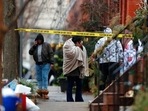 An unidentified woman reacts at the scene of a deadly row house fire, Wednesday, in the Fairmount neighborhood of Philadelphia.(AP) An unidentified woman reacts at the scene of a deadly row house fire, Wednesday, in the Fairmount neighborhood of Philadelphia.(AP)
