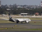 An Air New Zealand plane is seen taxiing from the international terminal at Sydney Airport.