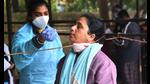 A health worker collects a swab sample for Covid-19 test at a UPHC in Sector 31, Gurugram, on Wednesday. (Vipin Kumar/HT PHOTO) A health worker collects a swab sample for Covid-19 test at a UPHC in Sector 31, Gurugram, on Wednesday. (Vipin Kumar/HT PHOTO)