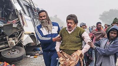 An injured passenger being taken to a hospital for treatment after a bus collided with a truck on Govindpur-Sahibganj National Highway, in Pakur district of Jharkhand, (PTI photo) An injured passenger being taken to a hospital for treatment after a bus collided with a truck on Govindpur-Sahibganj National Highway, in Pakur district of Jharkhand, (PTI photo)