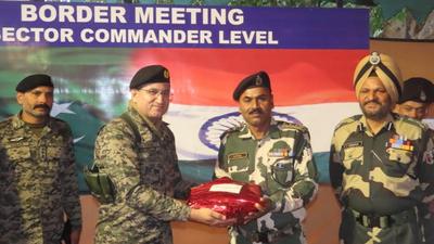 BSF and Pak Rangers officials during a sector commander-level meeting in Suchetgarh area on Wednesday. (HT Photo)