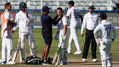 South Africa's Dean Elgar receives medical attention after being hit by the ball in the face during Day 3 of the second Test. (AP) South Africa's Dean Elgar receives medical attention after being hit by the ball in the face during Day 3 of the second Test. (AP)