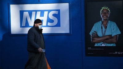 Britain's state-run National Health Service (NHS) is struggling with staff forced to stay at home after testing positive. (AFP)