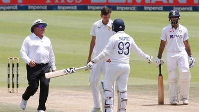 Cricket - Second Test - South Africa v India - Imperial Wanderers Stadium, Johannesburg, South Africa - January 5, 202 South Africa's Marco Jansen and India's Jasprit Bumrah clash as umpire Marais Erasmus looks on REUTERS/Rogan Ward (REUTERS)