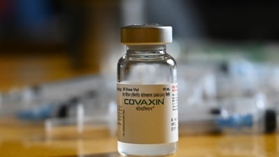 A Covaxin vial is seen during a vaccination drive against the Covid-19 coronavirus during a vaccination drive for youths in the 15-18 age group, at a school in Kolkata on January 4, 2022. (Photo by DIBYANGSHU SARKAR / AFP) (AFP) A Covaxin vial is seen during a vaccination drive against the Covid-19 coronavirus during a vaccination drive for youths in the 15-18 age group, at a school in Kolkata on January 4, 2022. (Photo by DIBYANGSHU SARKAR / AFP) (AFP)