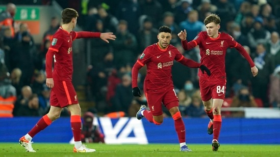 Liverpool's Alex Oxlade-Chamberlain celebrates with teammates after scoring a goal(AP) Liverpool's Alex Oxlade-Chamberlain celebrates with teammates after scoring a goal(AP)