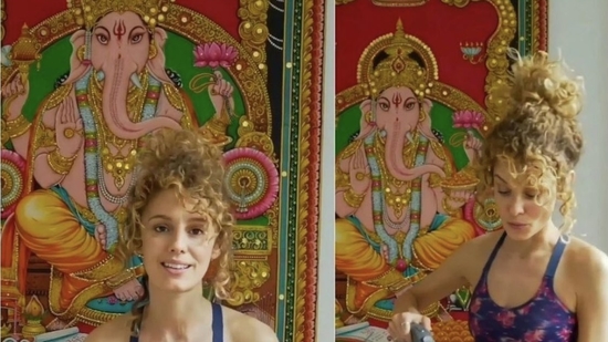 Esther Acebo with Lord Ganesha painting.
