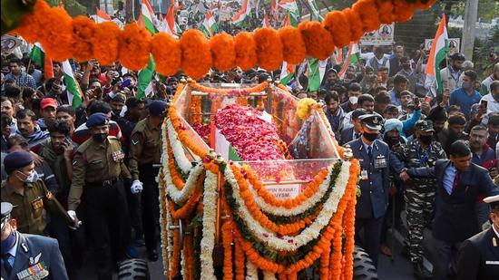 People participate in the funeral procession of late Chief of Defence Staff (CDS) Gen Bipin Rawat from his residence to Brar Square in the Delhi cantonment, in New Delhi on December 10, 2021. (PTI/ File)
