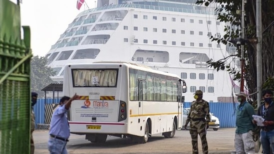 A tourist bus at the International Cruise Terminal to pick up the passengers from the Covid-hit Cordelia cruise ship.(PTI)