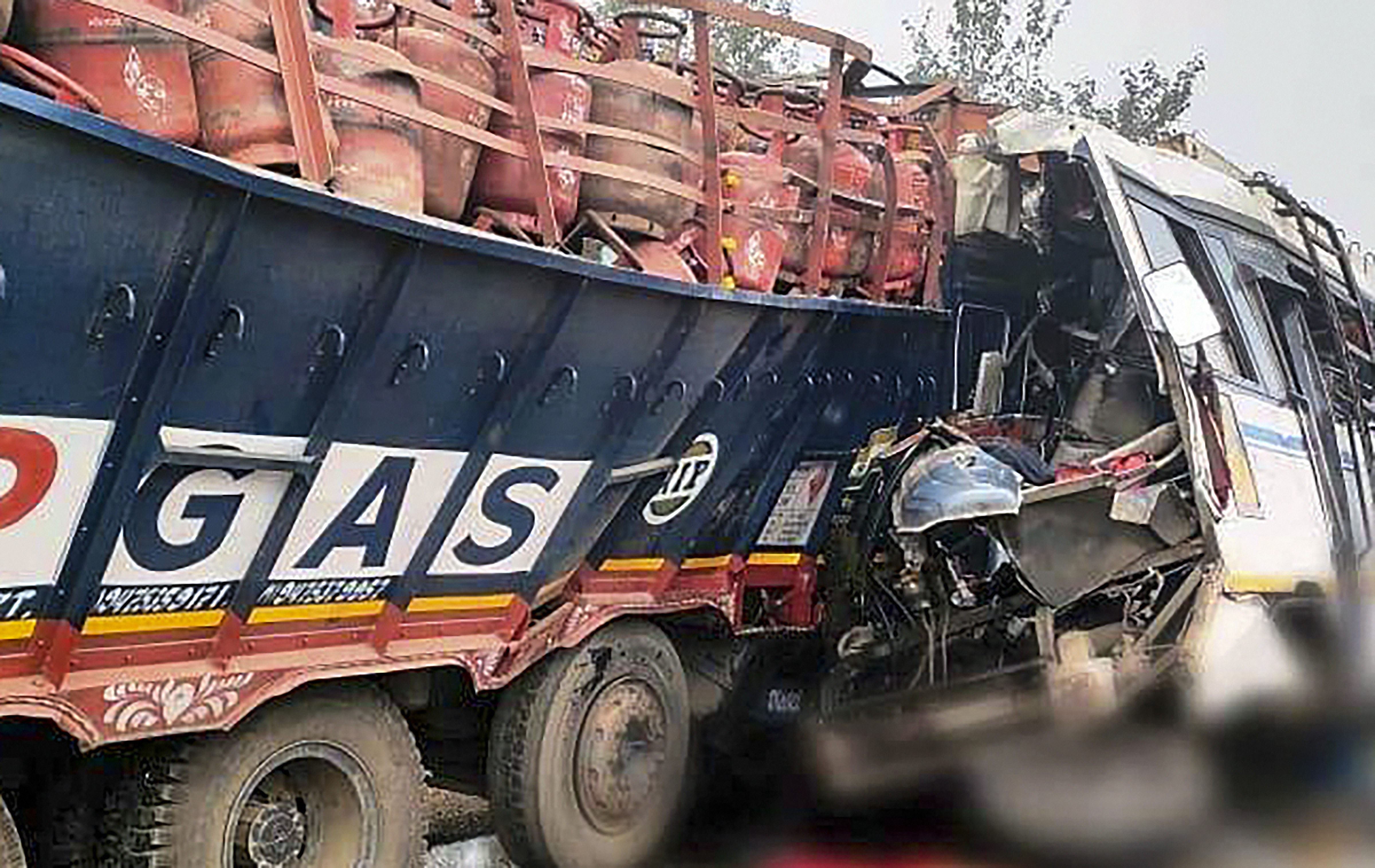 Mangled remains of the truck that collided with a bus in Pakur district of Jharkhand on Wednesday. (PTI) Mangled remains of the truck that collided with a bus in Pakur district of Jharkhand on Wednesday. (PTI)