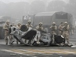 Dozens of anti-government protesters were killed by security forces, police said Thursday, after President Kassym-Jomart Tokayev ordered them to put down the demonstrations, which have drawn thousands.