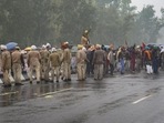 Punjab Police personnel stand guard as protestors stage a demonstration to block Prime Minister Narendra Modi's cavalcade, in Ferozepur on Wednesday.(PTI Photo) Punjab Police personnel stand guard as protestors stage a demonstration to block Prime Minister Narendra Modi's cavalcade, in Ferozepur on Wednesday.(PTI Photo)