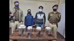 The accused and the recovered arms in custody of Chandigarh Police. (HT Photo)
