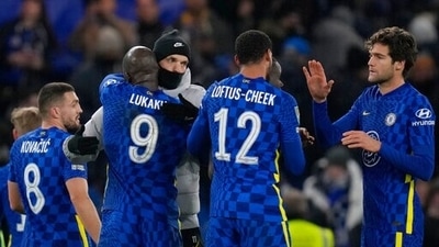 Chelsea's head coach Thomas Tuchel celebrates with players at the end of the English League Cup semifinal first leg match between Chelsea and Tottenham Hotspur at Stamford Bridge stadium in London, Wednesday. (AP) Chelsea's head coach Thomas Tuchel celebrates with players at the end of the English League Cup semifinal first leg match between Chelsea and Tottenham Hotspur at Stamford Bridge stadium in London, Wednesday. (AP)