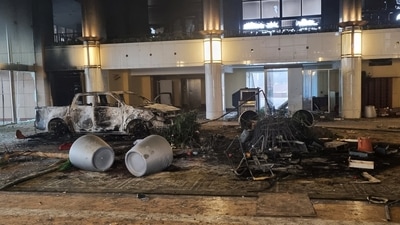 A burned car is seen inside the Presidential Residence which was stormed by demonstrators during the protests triggered by fuel price increase in Almaty, Kazakhstan. (REUTERS)