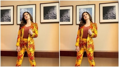Zareen paired the pant suit with a contrasting soft maroon top as she posed for the pictures. (Instagram/@zareenkhan)