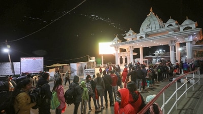 Devotees stand in queue outside Darshani Deodi while on their way to Mata Vaishno Devi shrine, in Reasi district, on Sunday. (PTI File Photo)