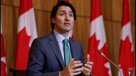 Prime Minister Justin Trudeau takes part in a news conference, as the latest Omicron variant emerges as a threat amid the Covid-19 pandemic, in Ottawa, Ontario, Canada on Wednesday. (REUTERS)