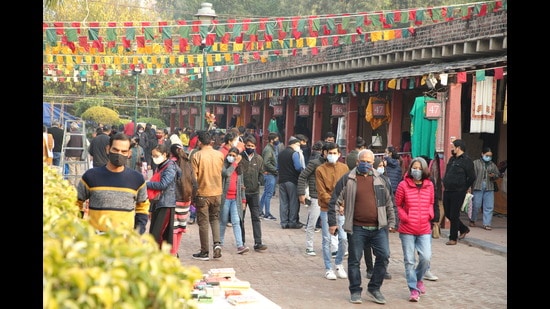 Visitors are mandated to wear face masks at the fortnight-long fair, which will remain shut on weekends in accordance with Covid-19 curbs in the Capital. (Photo: Manoj Verma/HT)
