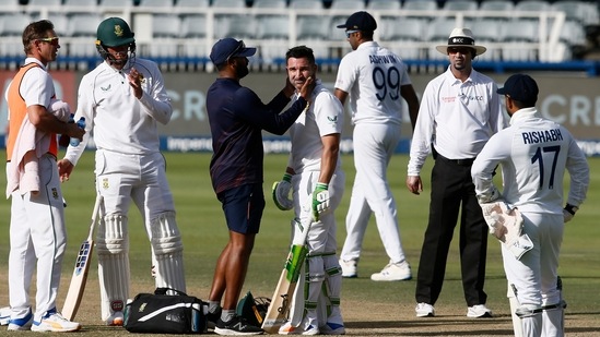 South Africa's Dean Elgar receives medical attention after being hit on the helmet by the ball. (AP) South Africa's Dean Elgar receives medical attention after being hit on the helmet by the ball. (AP)