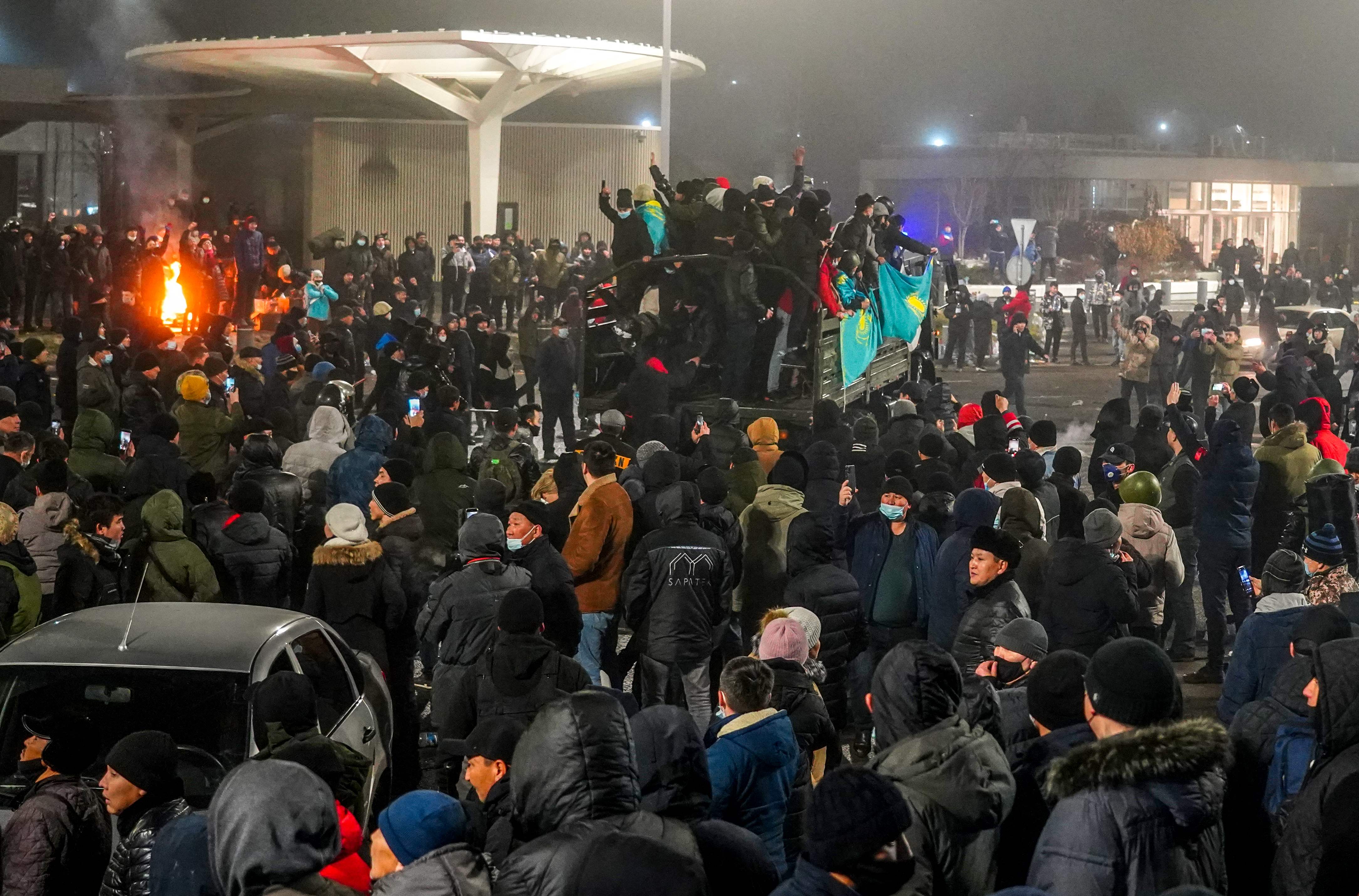 Protesters take part in a rally over a hike in energy prices in Almaty on January 5, 2022.&nbsp; (AFP)